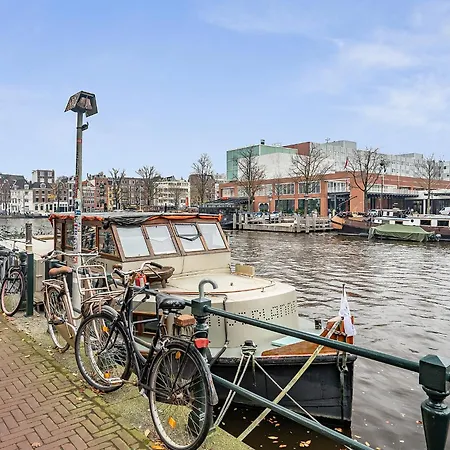 Amstel Houseboat Right Across The Opera Амстердам